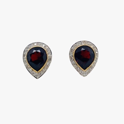 A PAIR OF GARNET AND DIAMOND CLUSTER EARRINGS