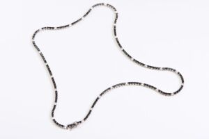 A BLACK AND WHITE DIAMOND NECKLACE