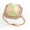 AN OPAL AND DIAMOND RING - 4