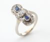 A SAPPHIRE AND DIAMOND PLAQUE RING