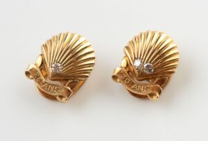 A PAIR OF VINTAGE CARTIER DIAMOND SET CUFFLINKS