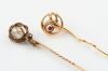 TWO ANTIQUE GEM SET STICK PINS